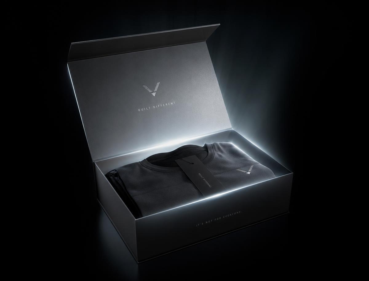 A sealed VYRE blind box opened on a dark surface