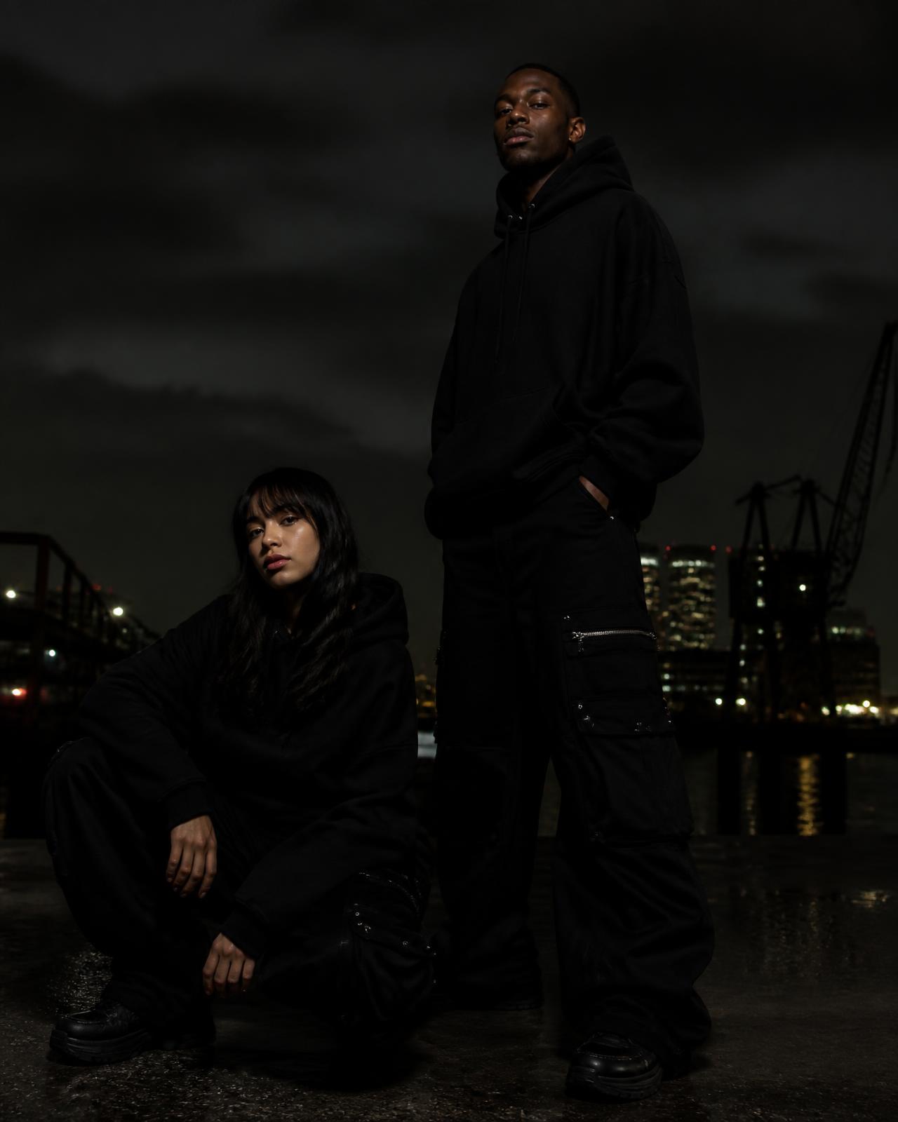 VYRE Eclipse campaign — all-black heavyweight streetwear shot at night